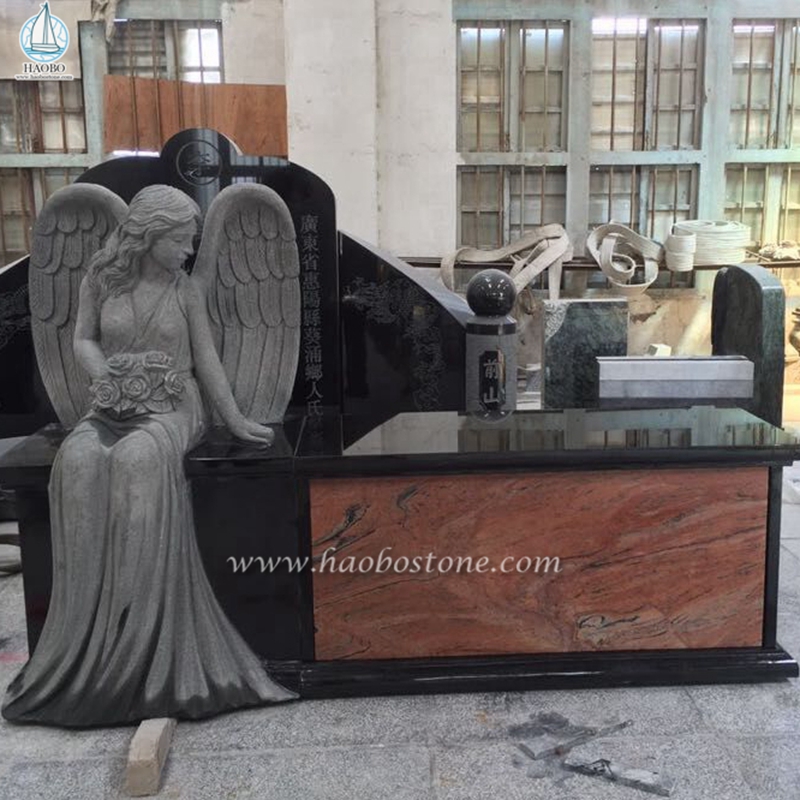 Banco del monumento del granito nero dell'India con la statua dell'angelo
