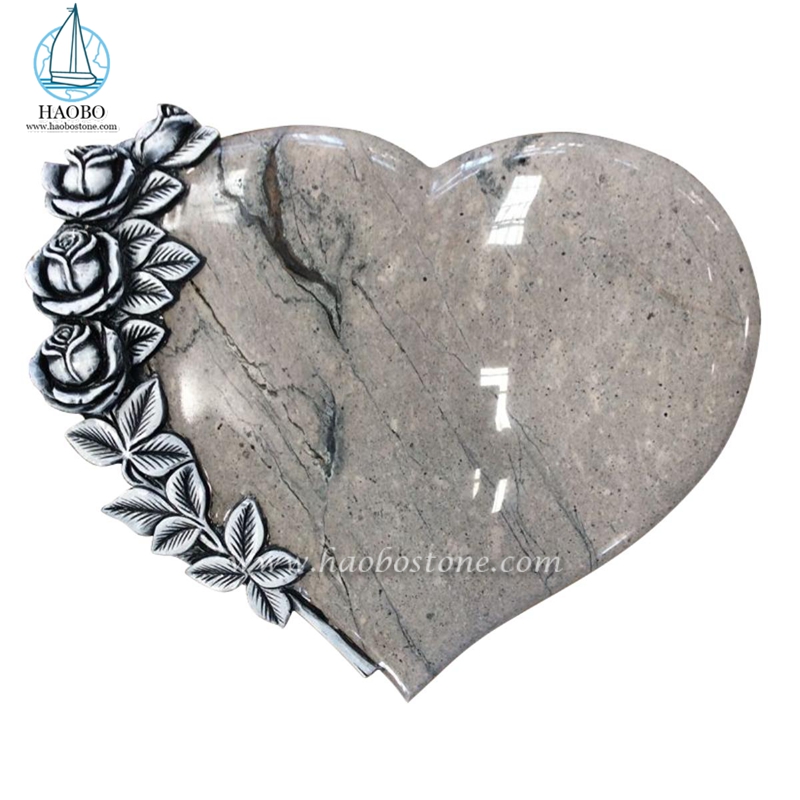 Granito di qualità a forma di cuore con pietra tombale intagliata a fiori
