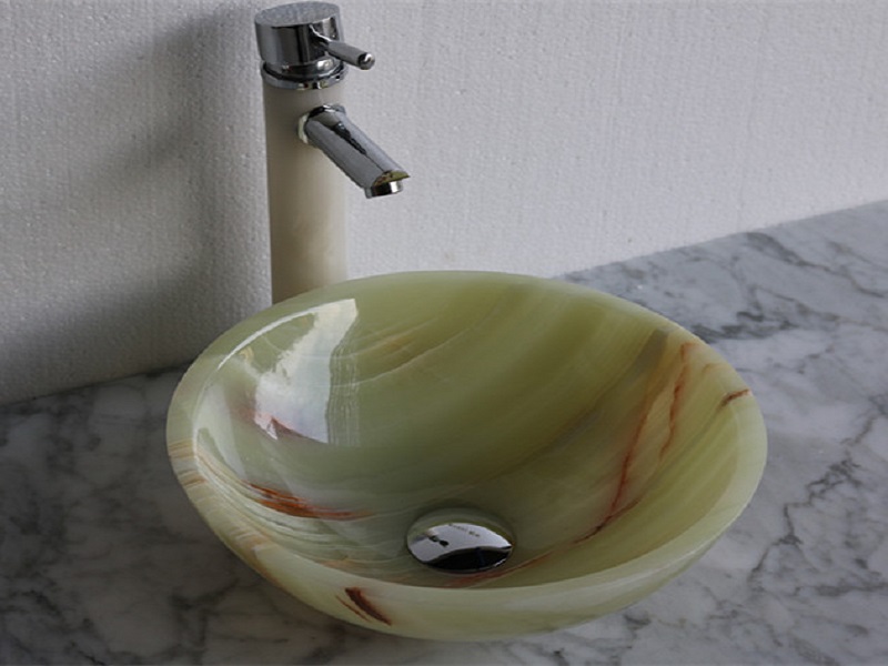 Lavabo e lavabo da bagno in onice di forma rotonda
