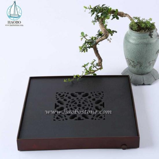 Vassoio da tè in pietra quadrata con intaglio vuoto in porcellana di design in granito nero
